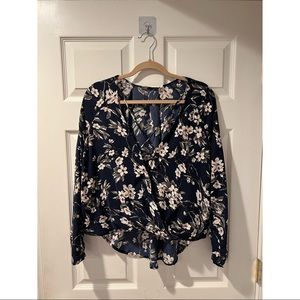Lush Floral Crisscross Neck Blouse